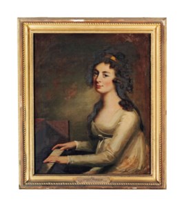 Portrait of Janet Hunter, half-length, in a white dress, seated at a piano