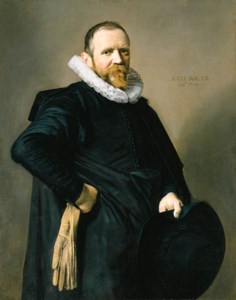 Portrait of a Gentleman, standing three-quarter length, wearing a black costume, a lace ruff, and holding a hat andsglove