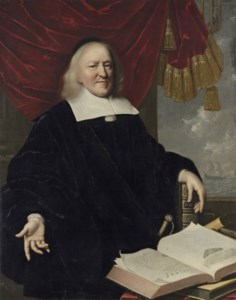 Portrait of Hendrik Thiebaut, three-quarter-length, in black, his left hand resting on a copy of the Bible, an open copy of Annales et Histoires des Troubles du Pais-Bas on the table in front of him, a draped curtain and coastal landscape beyond