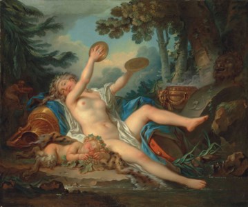 A wooded landscape with a bacchante playing the cymbals and a sleeping faun