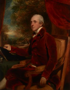 Portrait of William Baker, (1743-1824), three-quarter-length seated, in a red dress coat, with a landscape beyond