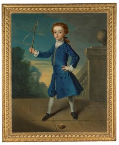Portrait of a boy, full-length, in a blue coat, with a spinning top on a terrace