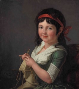 A young girl knitting