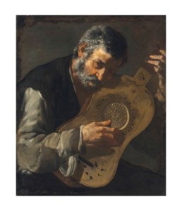 A man playing the guitar