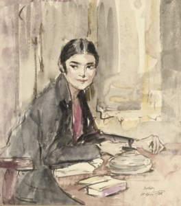 A girl writing at a table