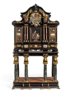 AN ITALIAN ORMOLU-MOUNTED PIETRA DURA AND EBONY CABINET-ON-STAND, THE CABINET ROME OR FLORENCE, SECOND HALF 17TH CENTURY, THE PIETRA DURA PANELS LARGELY ATTRIBUTED TO THE GRAND DUCAL WORKSHOPS, FLORENCE, MODIFIED IN THE 18TH CENTURY, WITH FURTHER EMBELLISHMENTS IN THE MID-19TH CENTURY INCLUDING THE STAND