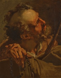 A bearded man, bust-length, holding a rosary