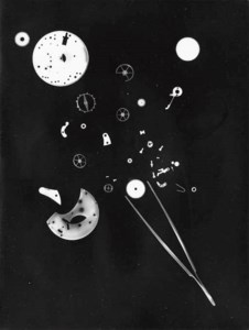 Photogram with tweezer and watch parts
