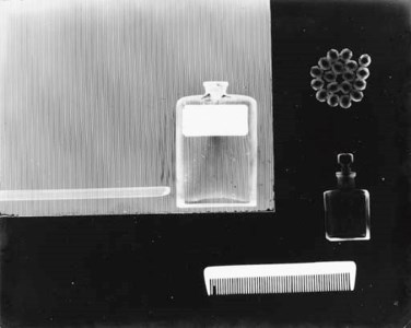 Photogram with bottles and comb
