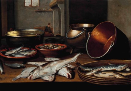 A kitchen interior with fish and utensils on a table