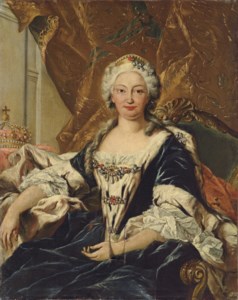 Portrait of Elisabetta Farnese, Queen of Spain, seated three-quarter-length, in an ermine-lined cloak, with a crown beside her, in a draped interior