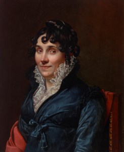 Portrait of a woman, traditionally identified as Henriette Lousbergs (1796-1827), half-length, seated, in a green gown and lace collar