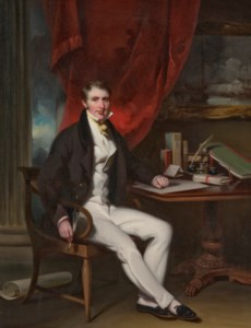 Portrait of William Jardine (1784-1843), full-length, seated, in a black coat, white waistcoat and trousers, his left arm resting on a table, before a red curtain, a landscape beyond