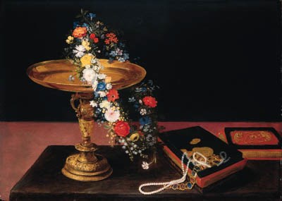 A garland of mixed flowers around a silver gilt tazza and a casket on a table