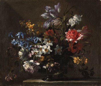 Narcissi, peonies, hyacinth, honeysuckle and a tulip in a glass vase on a ledge