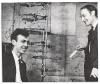JAMES D.; AND FRANCIS CRICK. Photograph Signed, by both, half-length portrait showing them beside a model of the