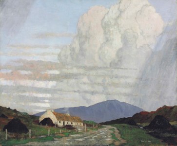 Thatched cottages by a roadside