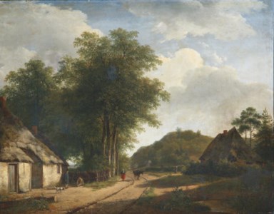 A woman on a sandy path in summer