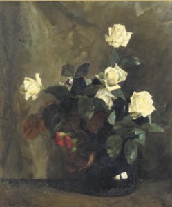 White rozes in a black vase