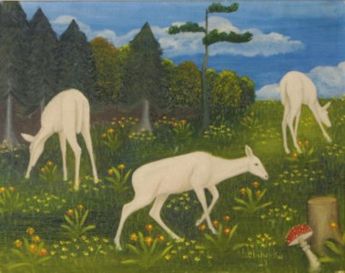 White fawns in a field