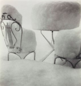 Chairs in snow, circa 1910