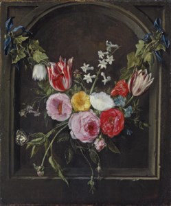 A swag of flowers hanging in a niche
