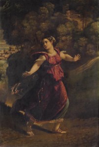 A woman fleeing on a wooded path