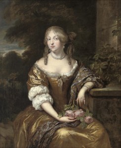 Portrait of a lady, seated three-quarter-length, in a gold dress and blue wrap with gold embroidery, a wooded landscape beyond