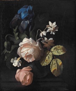 Roses, an iris and other flowers in a vase on a ledge