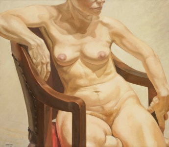 Model seated on chair