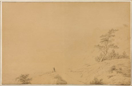 White chalk cliffs on the island of Möen, with a seated man looking at the sea with a telescope