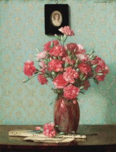 Pink carnations with an ivory fan