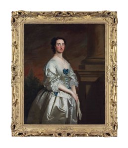 Portrait of a lady, three-quarter-length, in a white satin Van Dyck dress, trimmed with blue bows and lace, beside a column, in a landscape