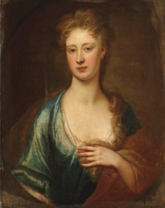 Portrait of a lady, traditionally identified as Catherine Perceval (c.1689-1749), Countess of Egmont, bust-length, in a blue dress and brown wrap, in a feigned oval