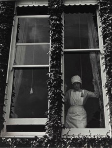 Parlourmaid at a Window in Kensington, c. 1939