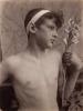 Male figure with headband and flowers