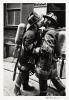 Firemen Kissing