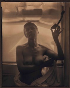Georgia O'Keeffe with African Statuary, c. 1919