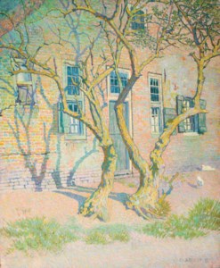 Trees in front of a farm