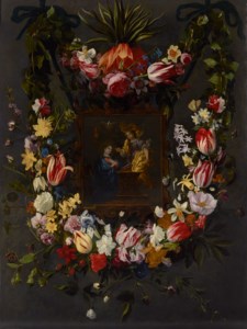 A festoon of flowers surrounding an image of the Annunciation