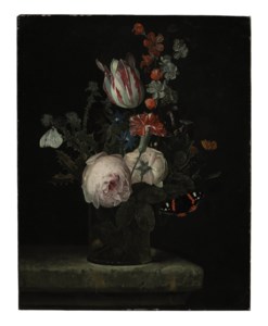 Flowers in a glass vase on a marble ledge with two butterflies