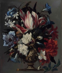 A parrot tulip, an African marigold, morning glory, hyacinths and other flowers in a sculpted urn, on a ledge