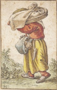 A peasant woman carrying a basket on her head