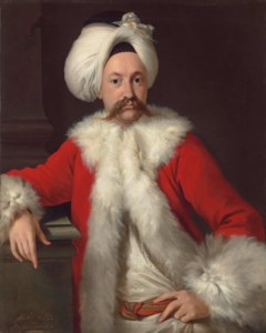 Portrait of a gentleman, possibly Richard Salwey, half-length, in a fur-trimmed red coat and a turban, leaning on a plinth