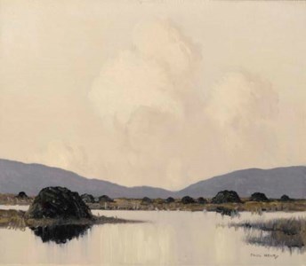 West of Ireland lake and mountain landscape from turf stacks