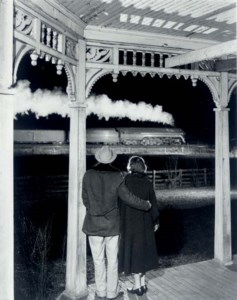 Mr. and Mrs. Pope watch the last steam powered passenger train, Max Meadows, Virginia, 1957