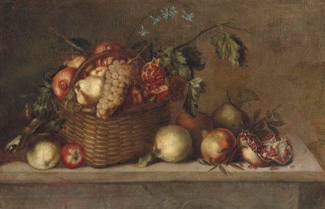 Pears, pomegranates and grapes in a basket and other fruit on a stone ledge