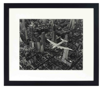 DC-4 flying over New York City, 1939