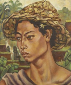 A Balinese boy with a sun hat