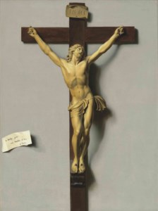 A trompe-l'oeil of an ivory and wood crucifix hanging on a wall